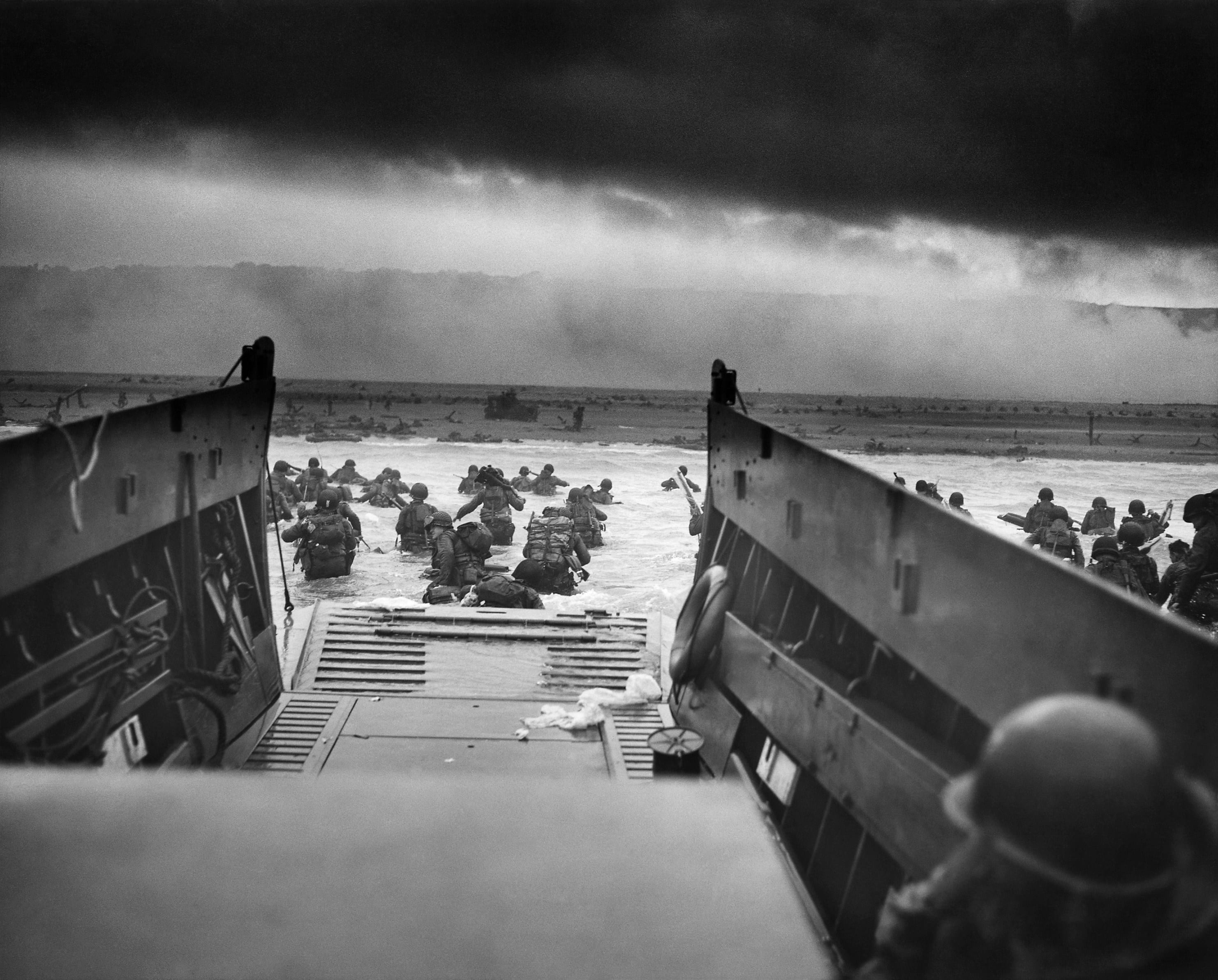 Image [June 6, 1944, an LCVP disembarks troops of Company E, 16th Infantry, 1st Infantry Division onto Omaha Beach in Normandy, France.]