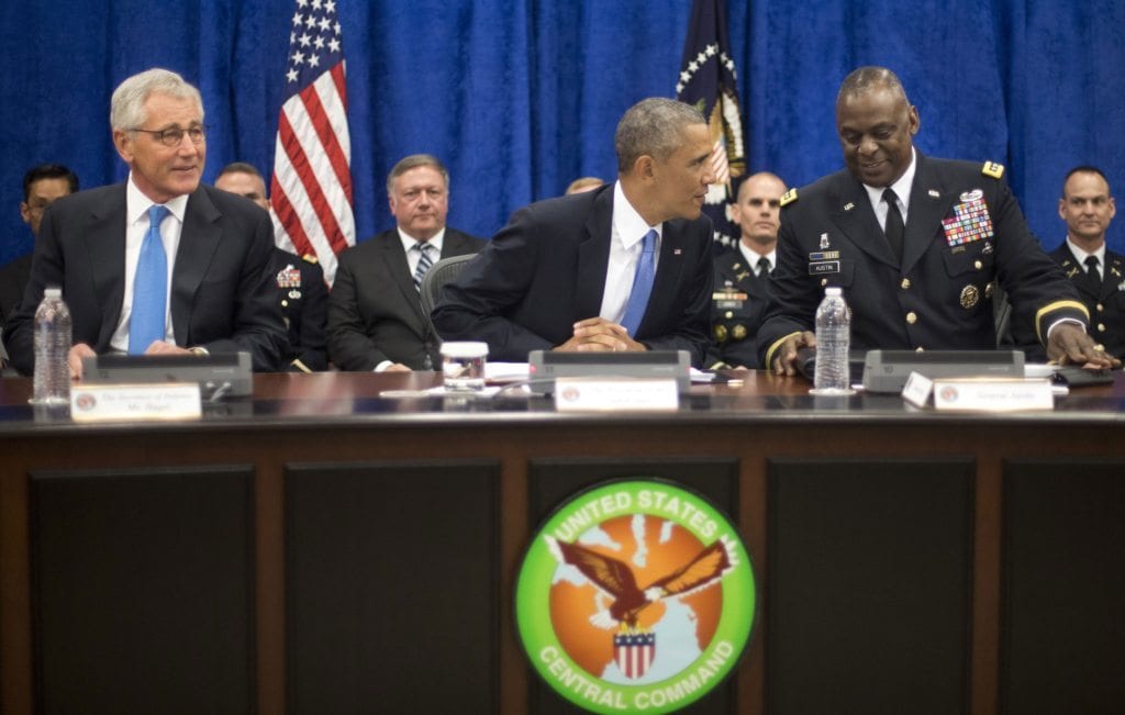 Secretary of Defense Chuck Hagel, left, President Barack Obama, and Gen. Lloyd J. Austin III, right [AP]