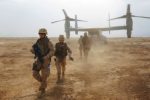 Image US Navy personnel disembark a V-22 Osprey