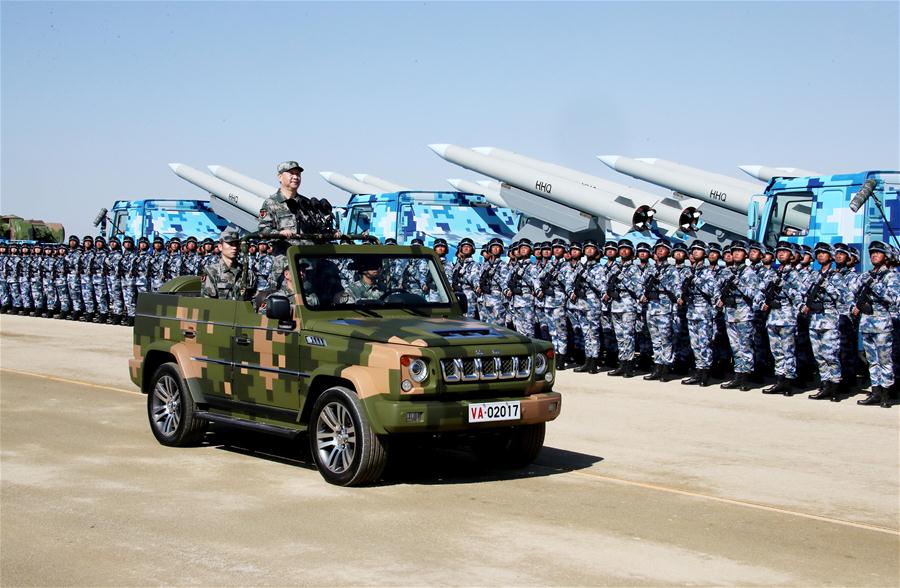 Image Chinese President Xi Jinping Reviews Parade in Field for First Time