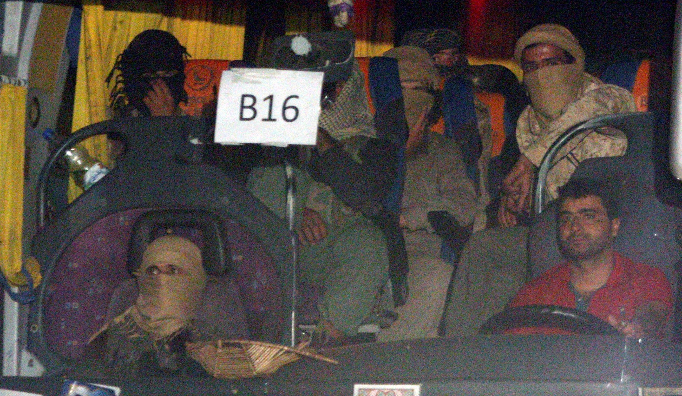 Image Islamic State fighters and their families leaving Lebanon on Monday after the Lebanese Army, in coordination with Hezbollah and the Syrian Army, arranged for hundreds to be given safe passage to Syria. (Omar Sanadiki/Reuters)