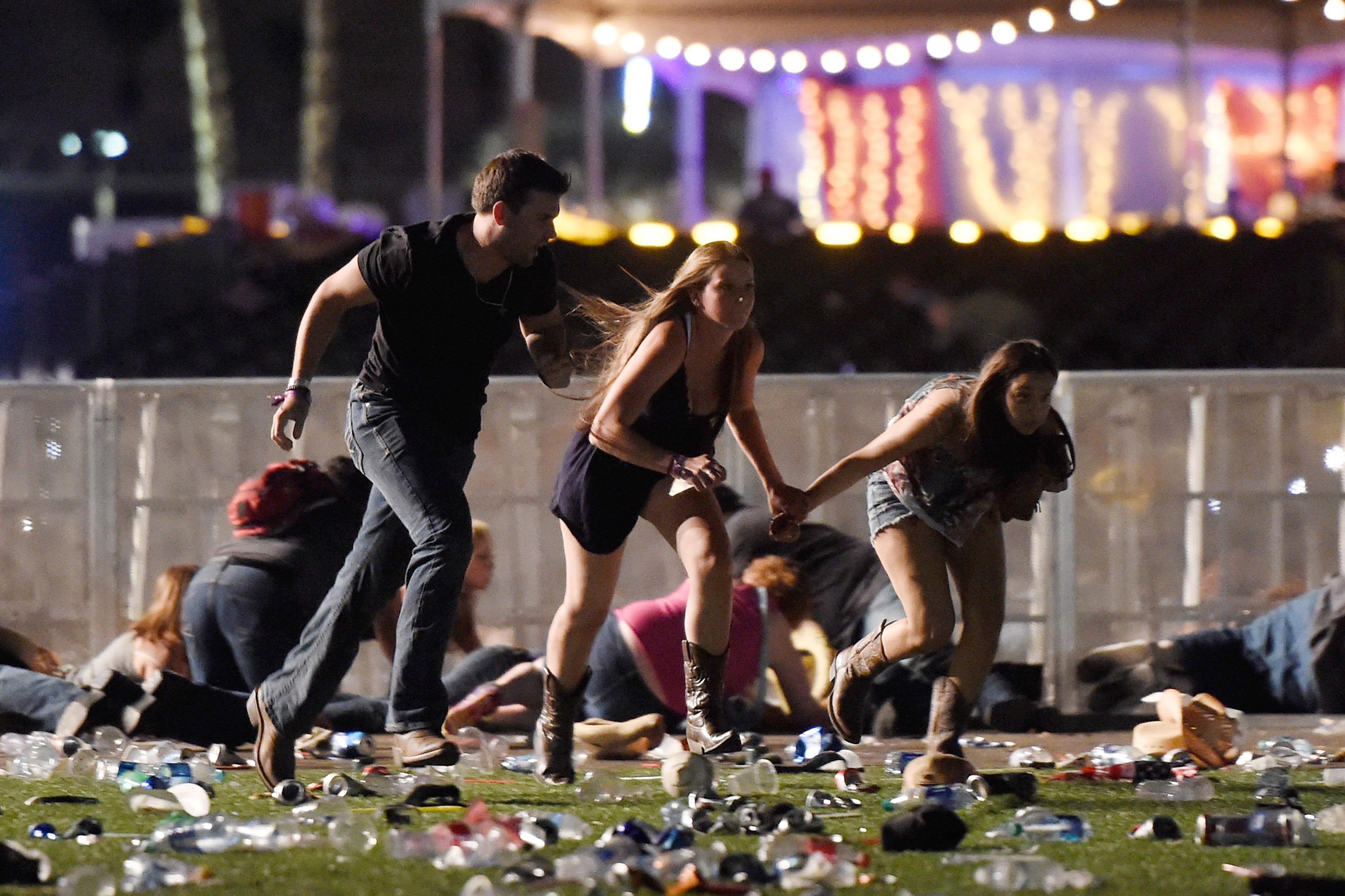 Image Concert goers flee from gun fire at the Route 91 Harvest country music festival, Las Vegas, October 1, 2017 (Photo by David Becker)