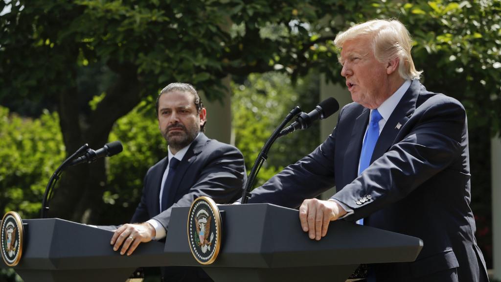 Image US President Donald Trump holds a news conference with Prime Minister of Lebanon Saad Hariri, July 25, 2017 (AP)