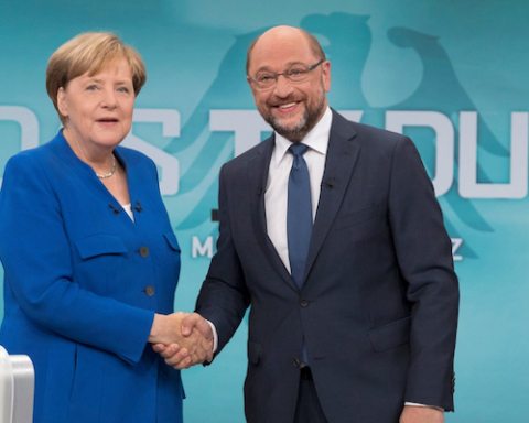 Title Image: German Chancellor Angela Merkel Martin Schulz shaking hands before their TV debate in Berlin in September. Photo: Reuters