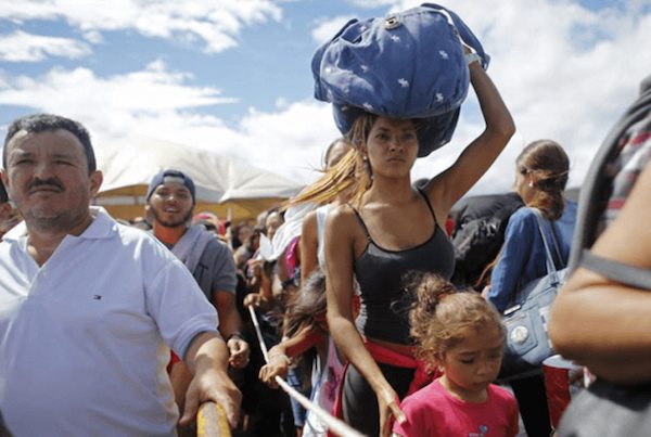 Image Venezuela’s mass exodus continues as Maduro opposition vows to boycott presidential election [Image: ARIANA CUBILLOS / AP]