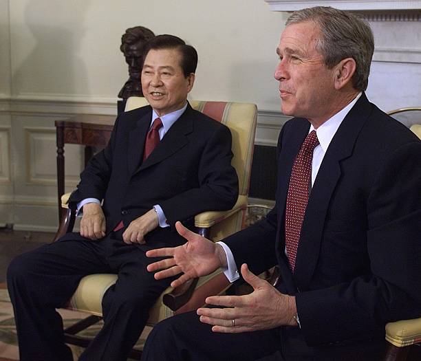 Image George W. Bush meets with South Korean President Kim Dae Jung March 07, 2001 [AFP PHOTO/Luke FRAZZA]