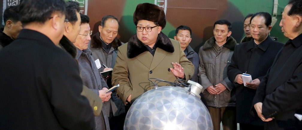 Image Kim Jong Un reviewing a “miniaturized” nuclear device. Although North Korean press claimed it to be a functional device, it may just be a model. (Image by North Korean state newspaper the Rodong Sinmun)