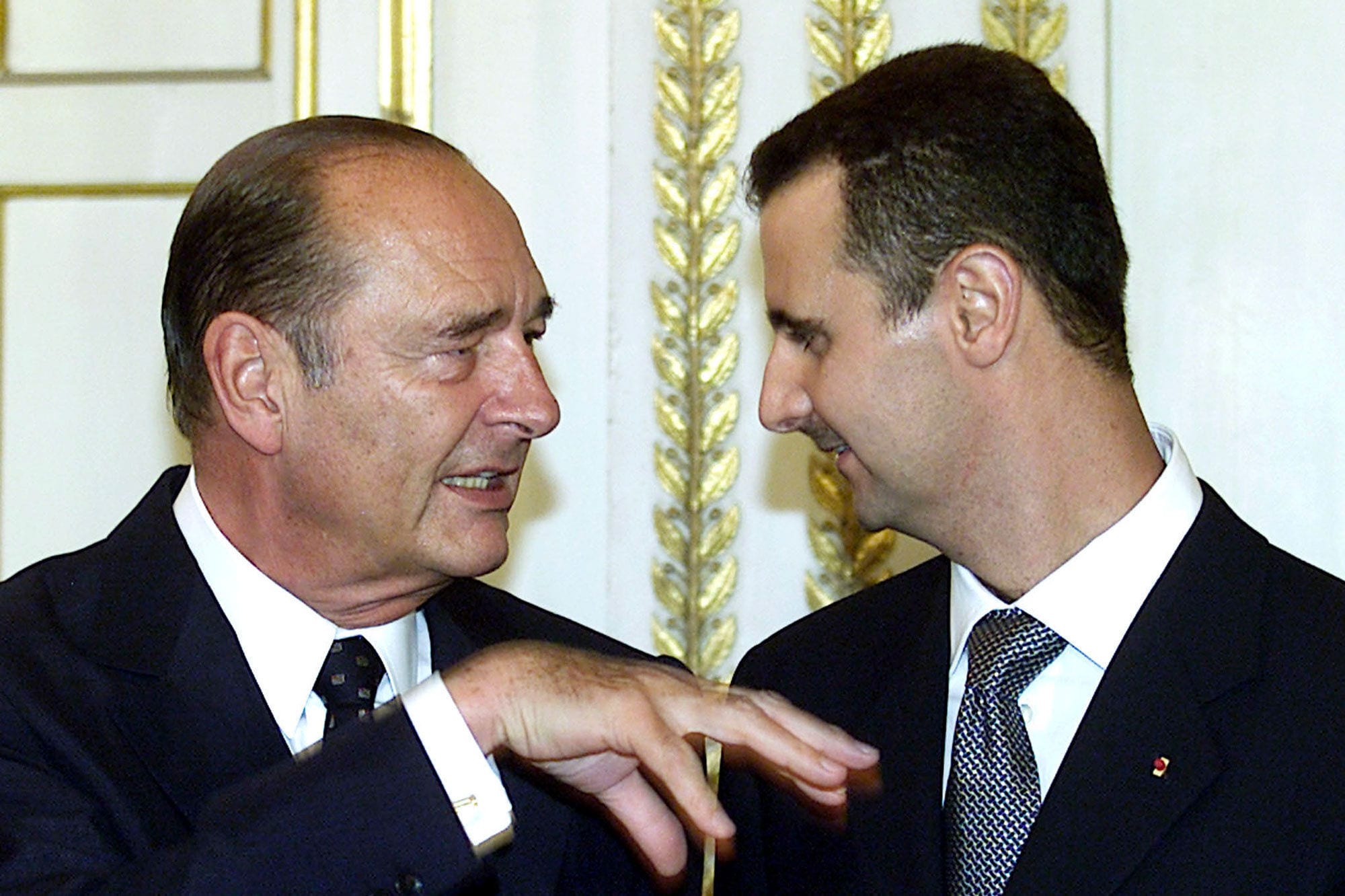 Image President Jacques Chirac with Bashar el-Assad, in June 2001 at the Elysee Palace, Paris (Reuters)