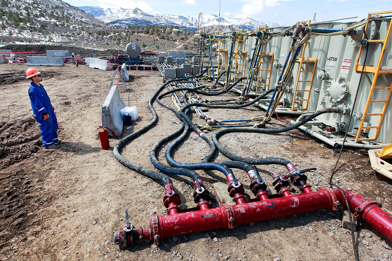 Image A worker monitors water pumping pressure and temperature at an Encana Oil & Gas Inc. fracking site, outside Rifle, Colorado (AP Photo/Brennan Linsley)