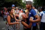 Image Prison fire and riots throw more chaos into Venezuelan presidential elections [REUTERS/Carlos Garcia Rawlins]