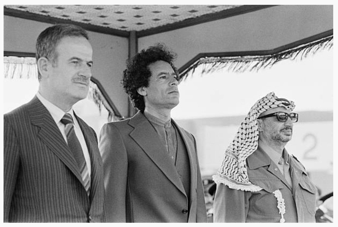 Image [Heads of state Hafez al Assad, Muammar al-Qaddafi and Yasser Arafat during the 4th summit of the Steadfastness and Confrontation National Front, in Tripoli, April 12, 1980] 