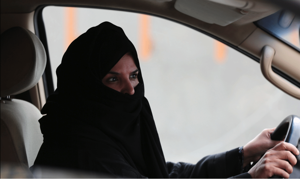 Image Aziza Yousef participates in a campaign defying the ban on women’s driving by driving a car on a highway in Riyadh in 2014 [Image: AP]