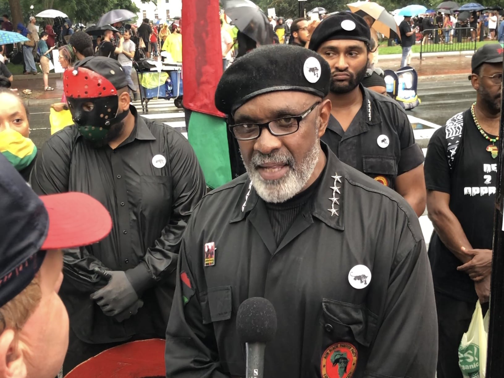 Image [Imam Akbar, Former National Minister Of Justice at The New Black Panther Party, came to protest at the Unite the Right 2 rally, Washington, D.C., August 12, 2018][Photo: Anthony A. LoPresti / Lima Charlie News]