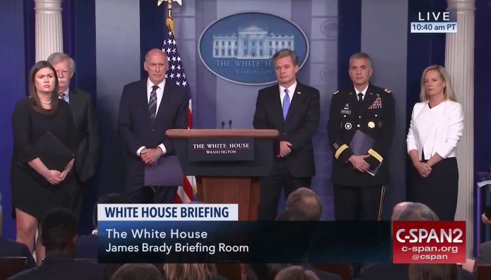 [l to r, White House Press Secretary Sarah Sanders, National Security Adviser John R. Bolton, Director of National Intelligence Dan Coats, FBI Director Christopher A. Wray, National Security Agency head Gen. Paul M. Nakasone, Secretary of Homeland Security Kirstjen Nielsen (CSPAN)]