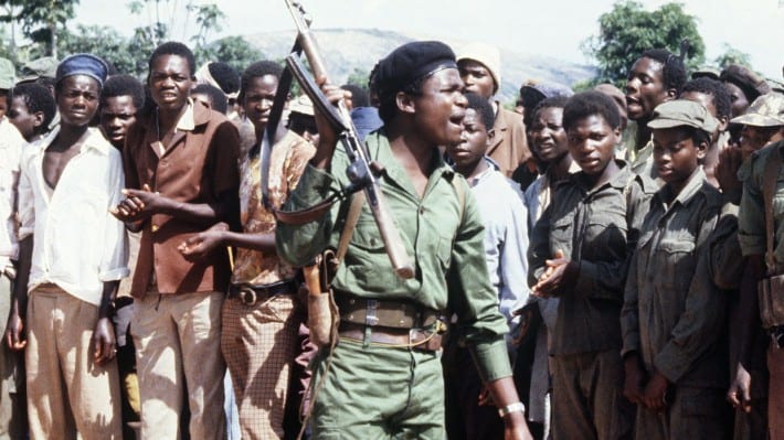 Image A picture taken on February 6, 1980 shows members of the Zimbabwean African Liberation Army (ZALA), led by Robert Mugabe, staging a rally in an unknown place in Zimbabwe. 