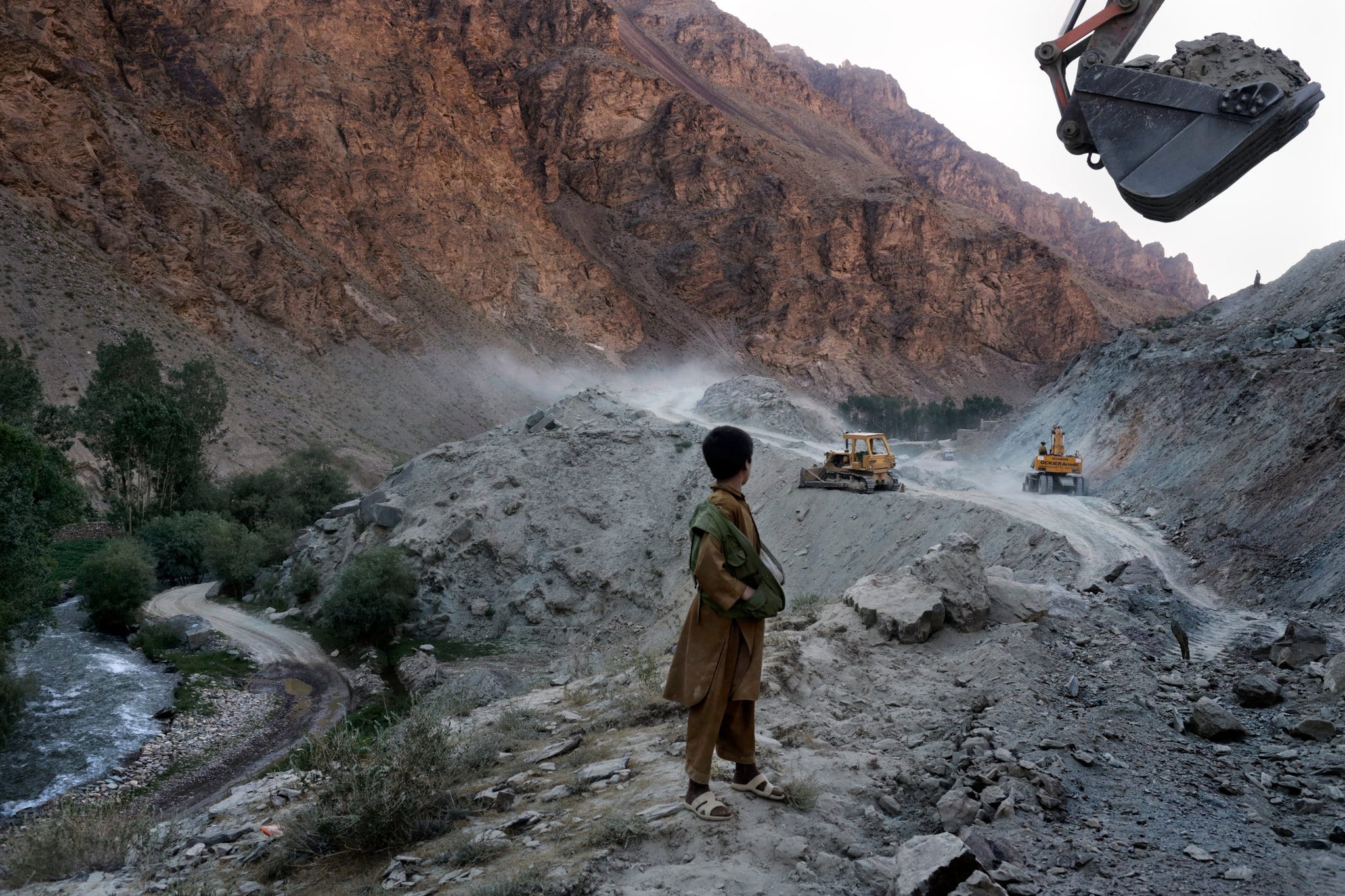 Image Road construction near an iron ore mine near Bamiyan, Afghanistan, in 2012. The country’s lack of infrastructure has hindered efforts to exploit its natural resources. Credit: Mauricio Lima]