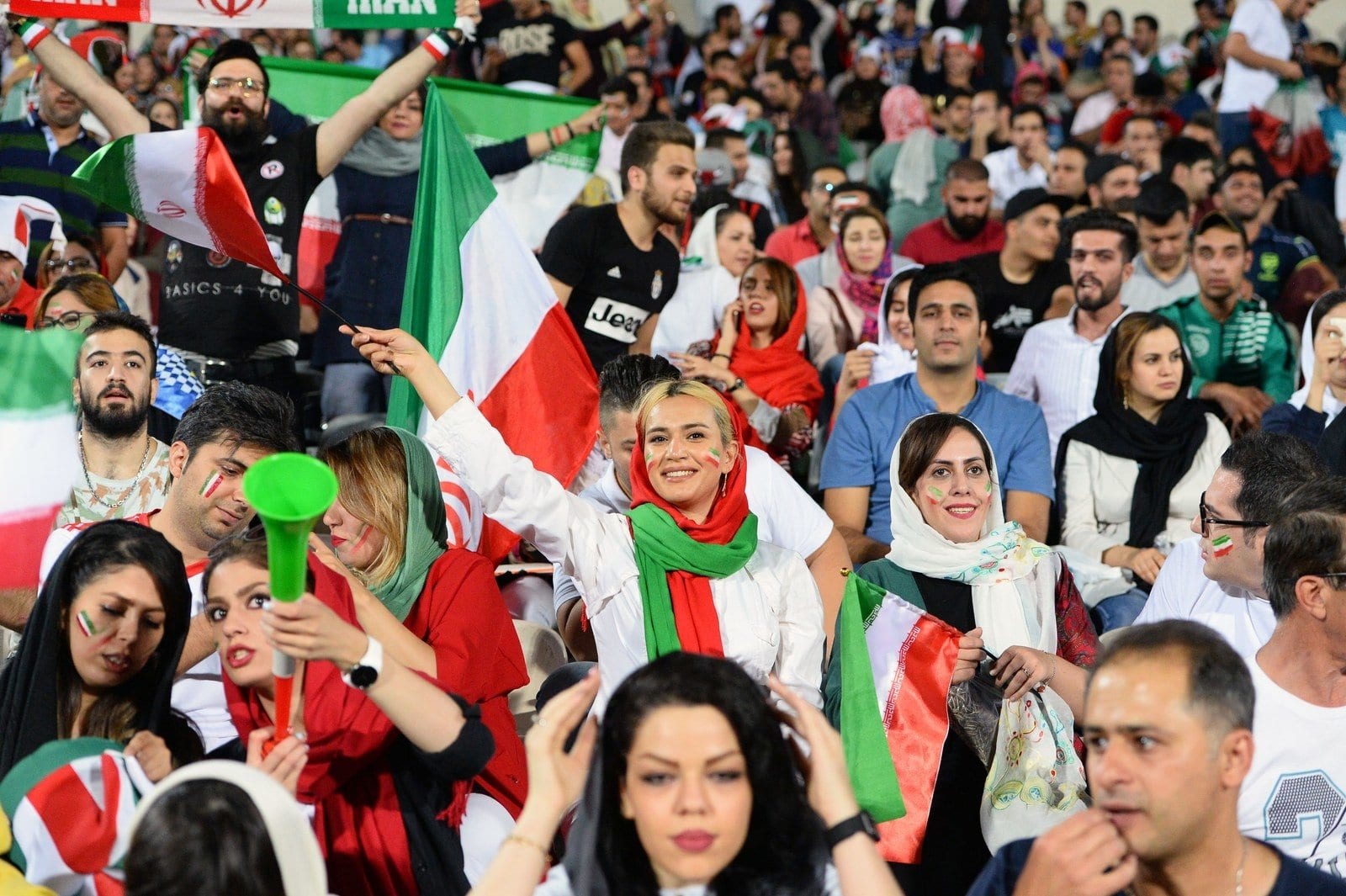 Image [A diverse crowd of Iranians in Tehran watch the World Cup after a 40 year prohibition against women attending public sporting events. June 20, 2018, Azadi Stadium, Tehran. (ANADOLU AGENCY)]