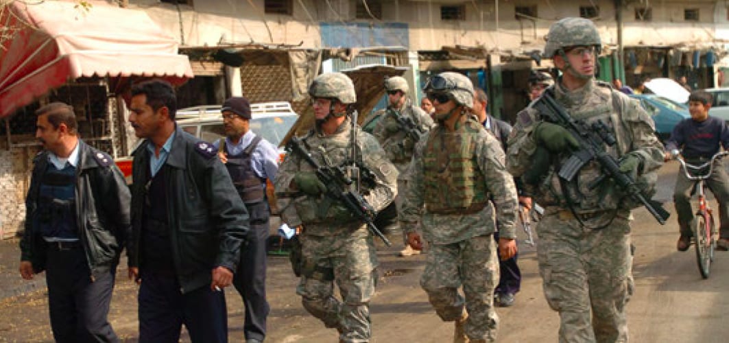 Image [Iraqi police and paratroopers from 2d BCT, 82d Airborne Division, patrol Adhamiyah, February 17, 2007][Source: U.S. Army Photo by Staff Sergeant Michael Pryor (Released)]