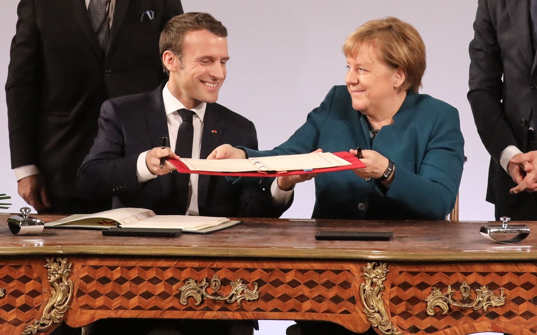 Image [German Chancellor Angela Merkel and French President Emmanuel Macron sign Treaty of Franco-German Cooperation and Integration, Aachen, Germany, Jan. 22, 2019 (Photo: Ludovic Marin / AFP)]