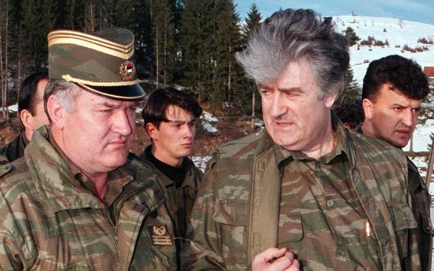 Image [Radovan Karadzic (R) and General Ratko Mladic, at Mt. Vlasic, April 1995 (Photo: RANKO CUKOVIC / REUTERS)]